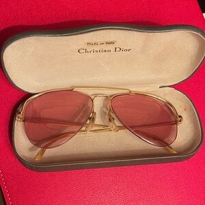 Christian Dior case holds Goldtone Frame,made in Paris. Sunglasses w/Rose Lenses